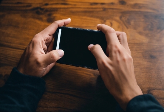 Brown, Hand, Communication Device, Wood, Gesture, Finger